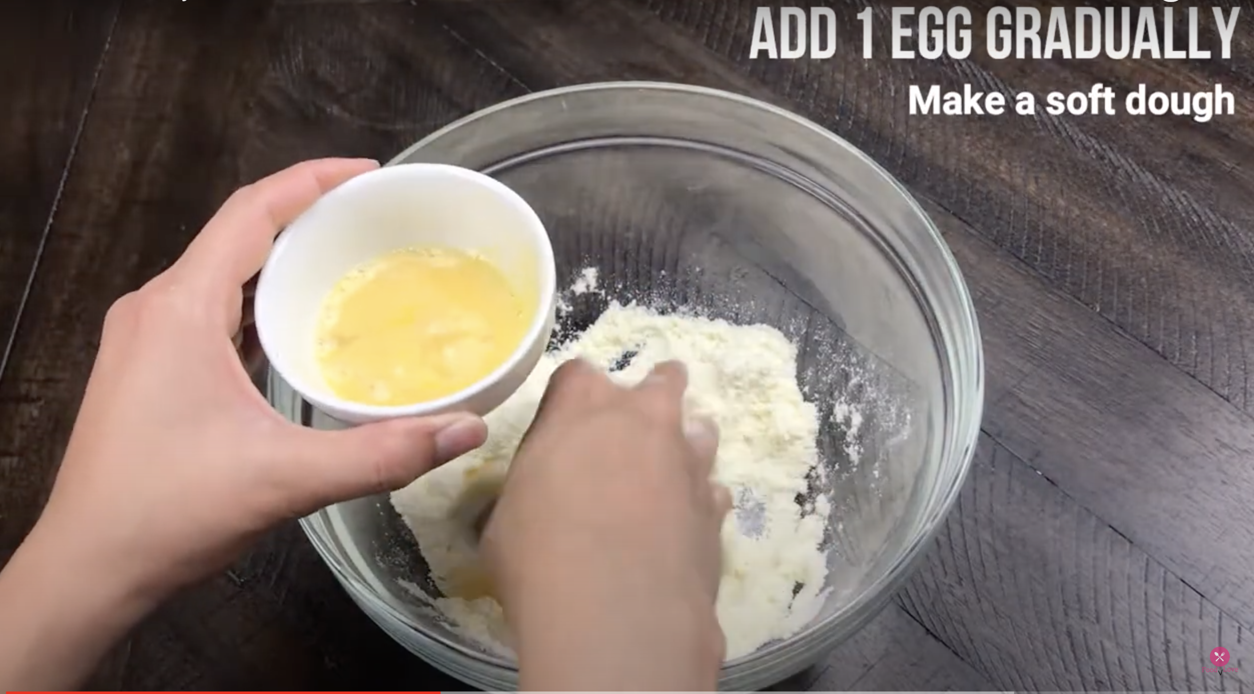 Add beaten egg gradually and make a soft dough.